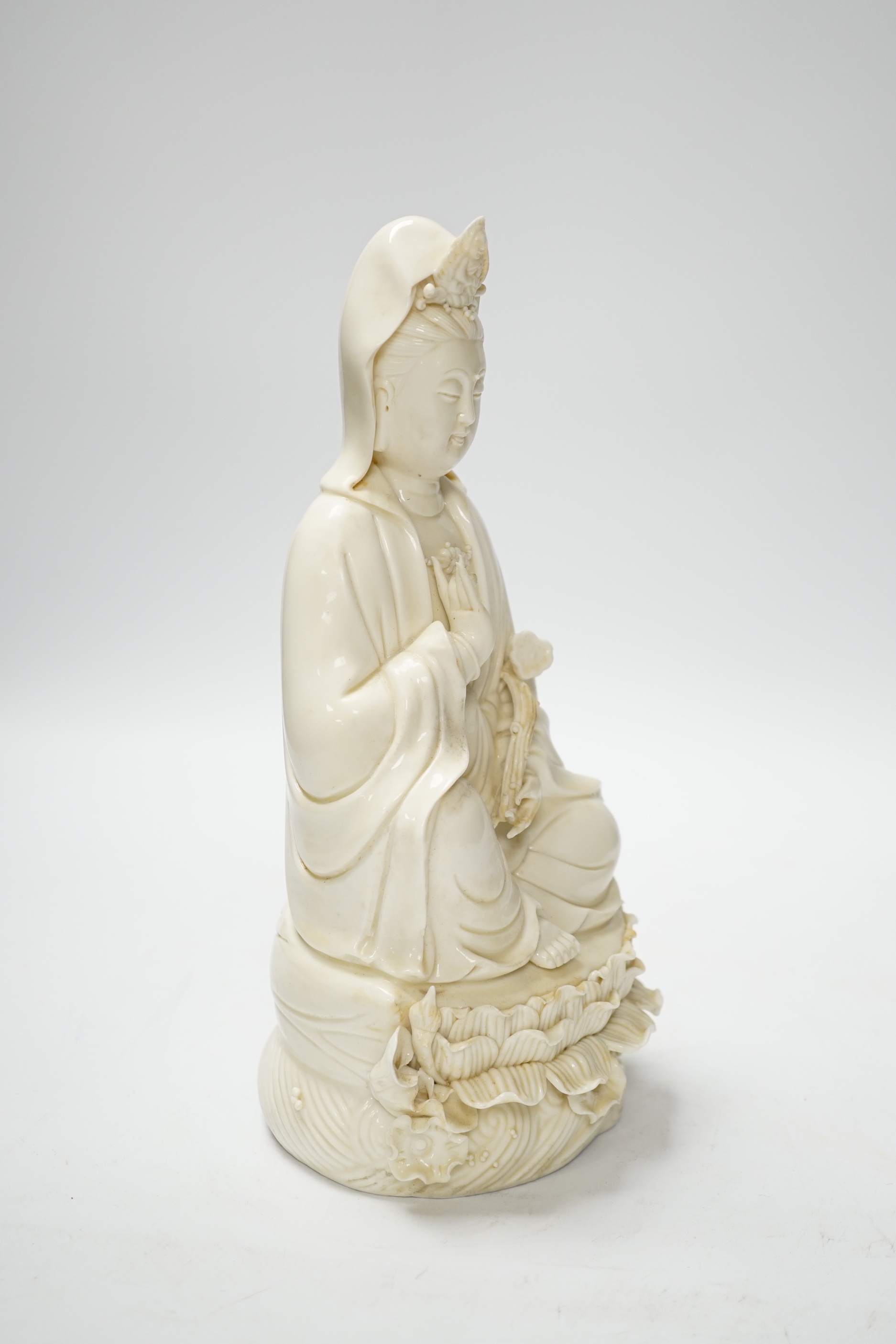 A Chinese blanc de chine figure of Guanyin, 26cm